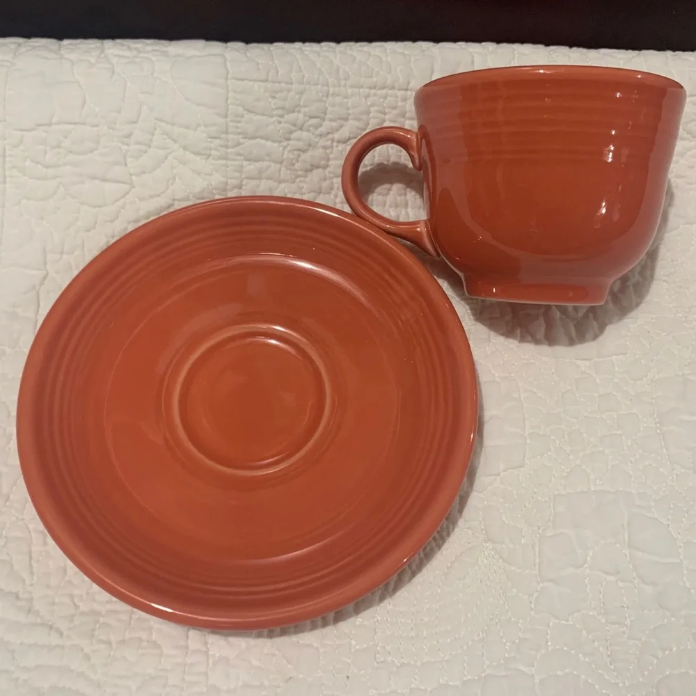 Pink orange Fiesta Fiestaware teacup and saucer